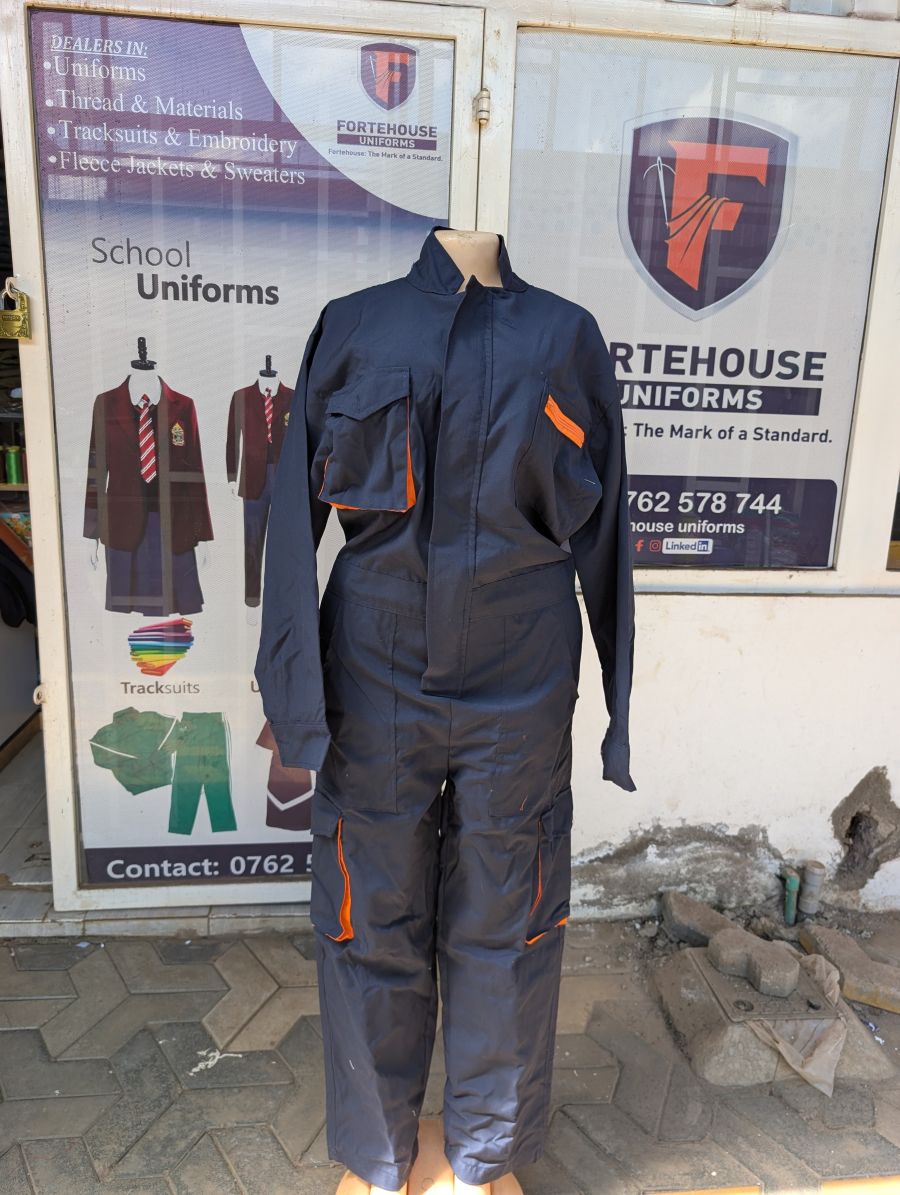 Navy industrial coverall with concealed zip front and orange trim by Fortehouse Uniforms